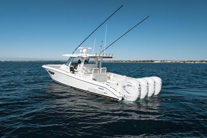 Moore Time Yacht Photos Pics 2023 Pursuit S 428 Sport boat on open water with four Yamaha engines.