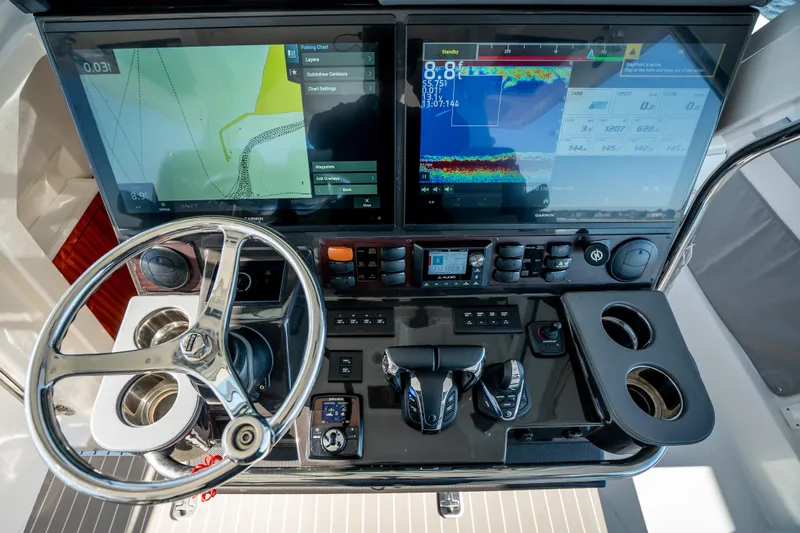Moore Time Yacht Photos Pics 2023 Pursuit S 428 Sport helm with dual displays and advanced controls.