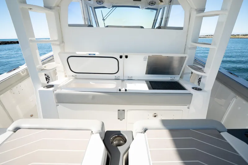 Moore Time Yacht Photos Pics 2023 Pursuit S 428 Sport boat interior with sleek design and modern amenities.