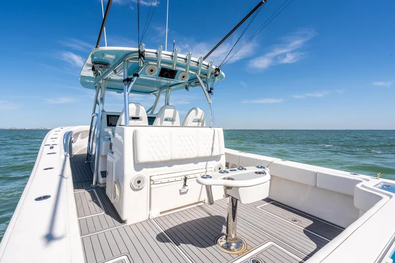  Yacht Photos Pics 2020 Front Runner 39 Center Console boat on open water, featuring sleek design and fishing equipment.