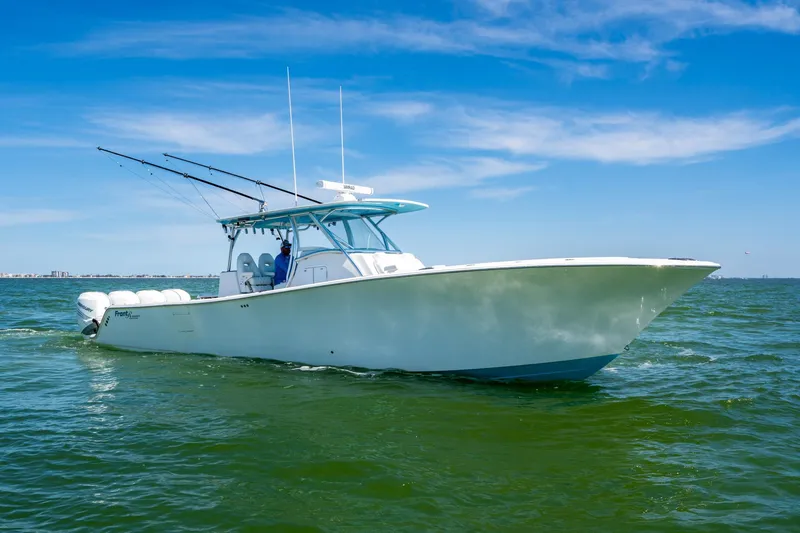  Yacht Photos Pics 2020 Front Runner 39 Center Console boat cruising on open water under clear blue sky.