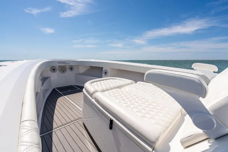  Yacht Photos Pics 2020 Front Runner 39 Center Console boat with white seating, ocean view, and blue sky.