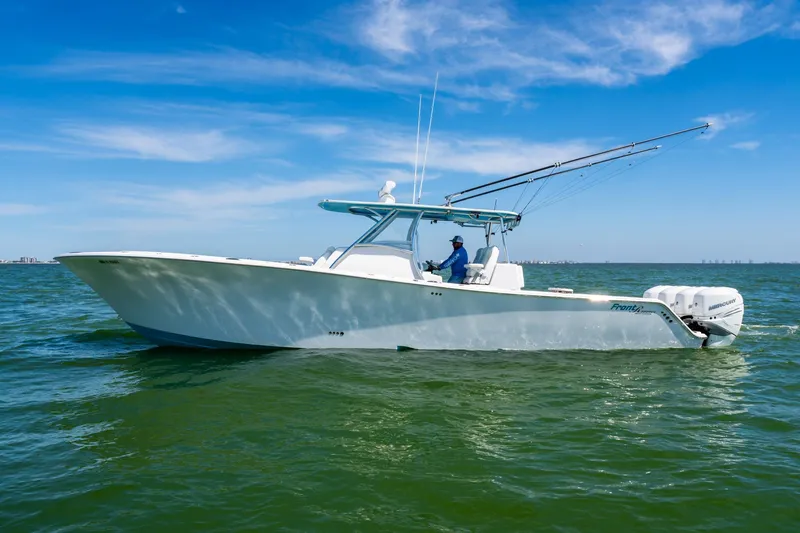  Yacht Photos Pics 2020 Front Runner 39 Center Console boat cruising on open water under blue sky.