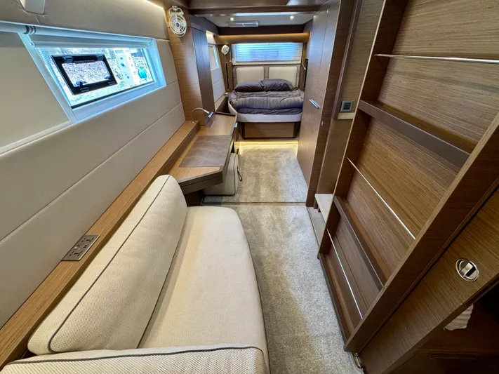 Promprang Yacht Photos Pics Luxurious interior of a 2020 Lagoon 50 yacht with modern furnishings and cozy bedroom.