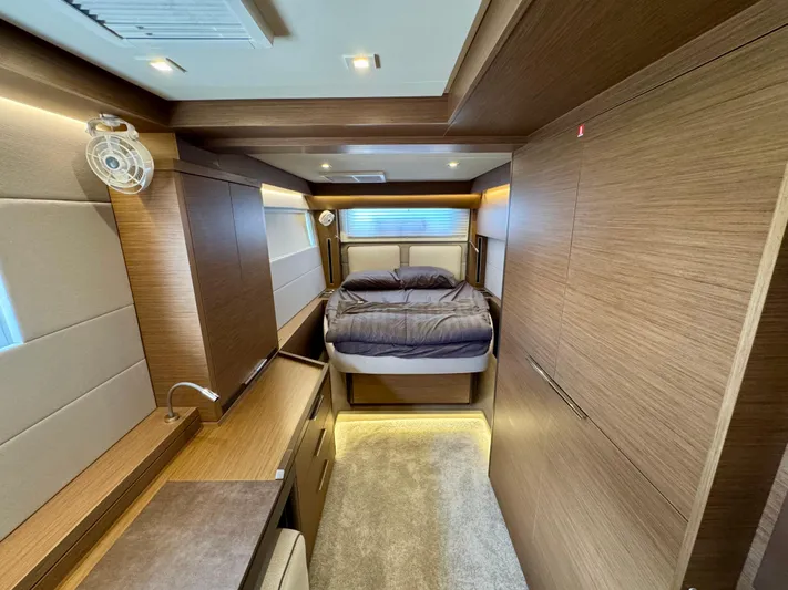 Promprang Yacht Photos Pics Luxurious interior of a 2020 Lagoon 50 yacht cabin with modern wood finishes.