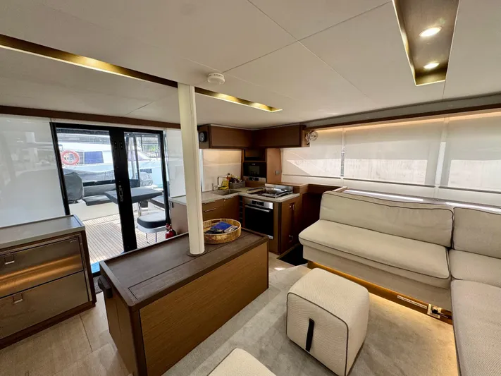 Promprang Yacht Photos Pics Luxurious interior of a 2020 Lagoon 50 yacht with modern furnishings and ample natural light.
