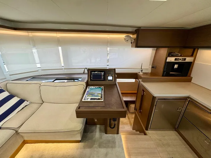 Promprang Yacht Photos Pics Luxurious interior of 2020 Lagoon 50 catamaran with modern kitchen and seating area.
