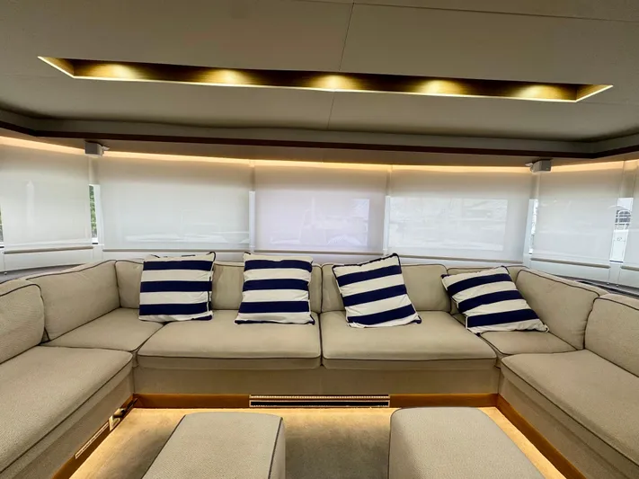 Promprang Yacht Photos Pics Luxurious interior of 2020 Lagoon 50 yacht with striped cushions and elegant lighting.