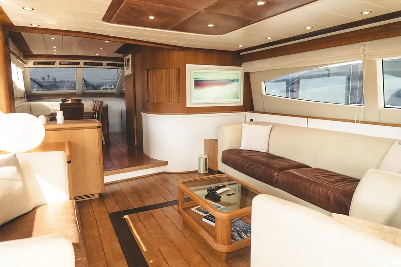  Yacht Photos Pics Luxurious interior of 2005 Canados 72 S yacht with elegant wood and leather furnishings.