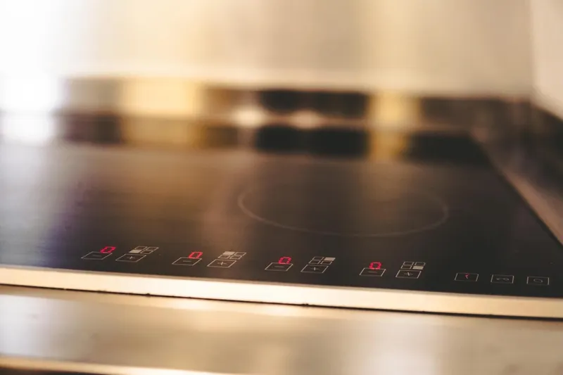  Yacht Photos Pics Modern induction cooktop with digital controls on a 2005 Canados 72 S yacht.