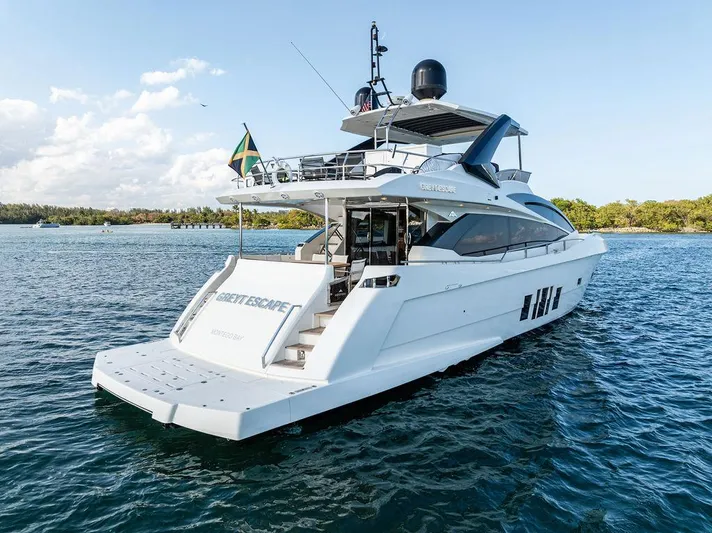 Greyt Escape Yacht Photos Pics Luxury 2013 Astondoa 72 GLX yacht cruising on serene waters.