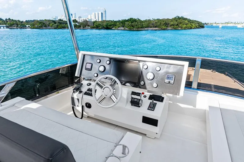 Greyt Escape Yacht Photos Pics Helm of 2013 Astondoa 72 GLX yacht with scenic ocean view.