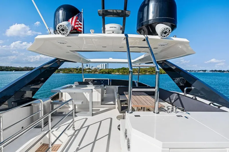 Greyt Escape Yacht Photos Pics Luxurious 2013 Astondoa 72 GLX yacht deck with modern amenities and scenic ocean view.