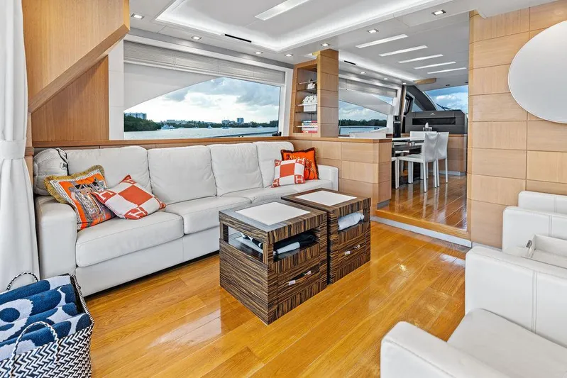 Greyt Escape Yacht Photos Pics Luxurious interior of 2013 Astondoa 72 GLX yacht with modern furnishings and wooden flooring.