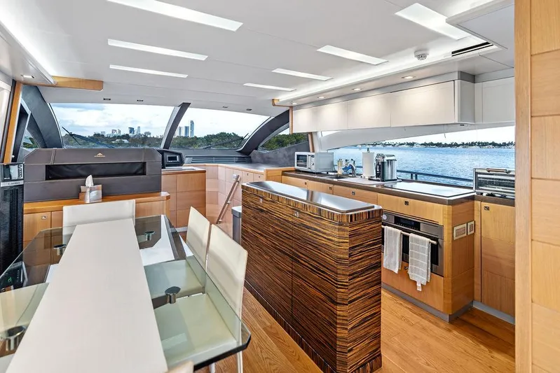 Greyt Escape Yacht Photos Pics Luxurious interior of 2013 Astondoa 72 GLX yacht with modern kitchen and dining area.