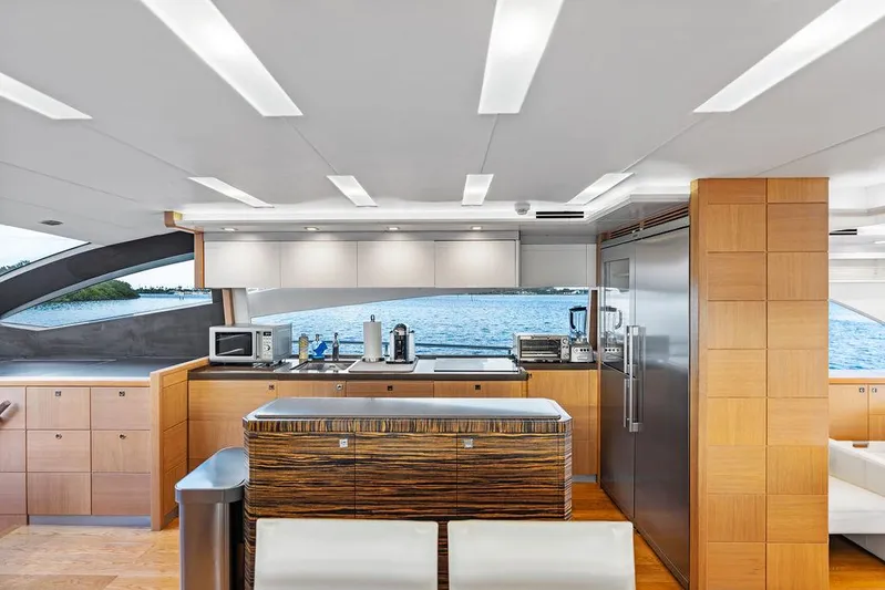 Greyt Escape Yacht Photos Pics Luxurious kitchen interior of 2013 Astondoa 72 GLX yacht with modern appliances and ocean view.