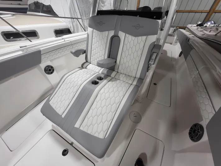  Yacht Photos Pics 2022 Fountain 38 SC boat interior with stylish gray and white seating.