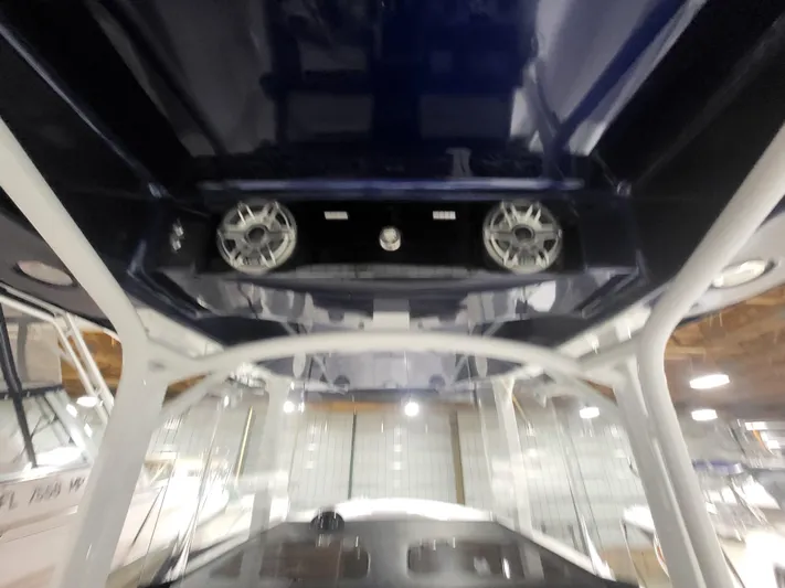  Yacht Photos Pics Interior view of 2022 Fountain 38 SC boat with speakers and control panel.