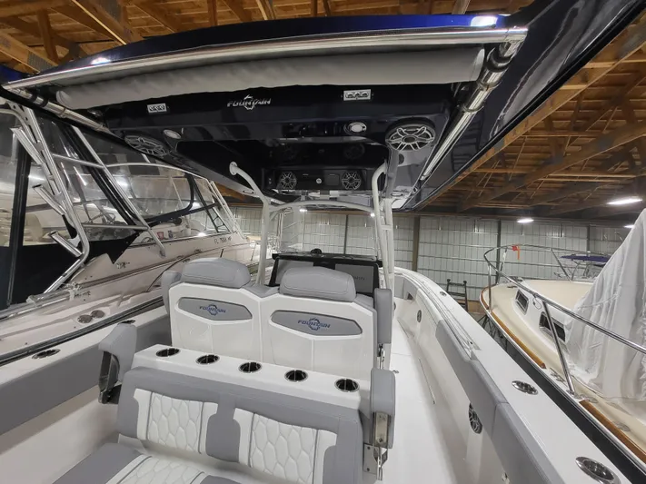  Yacht Photos Pics 2022 Fountain 38 SC boat interior with modern seating and sleek design.