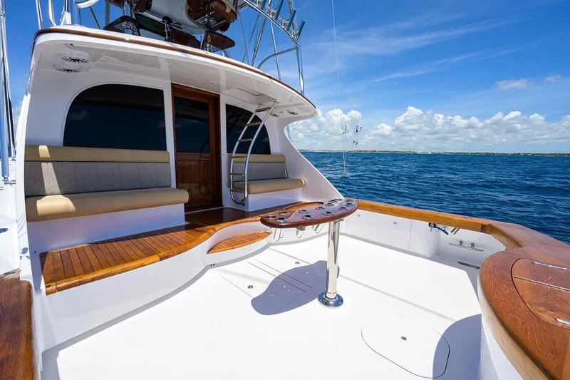  Yacht Photos Pics Luxury 2022 F&S 58 Custom Carolina yacht deck with seating, ocean view.