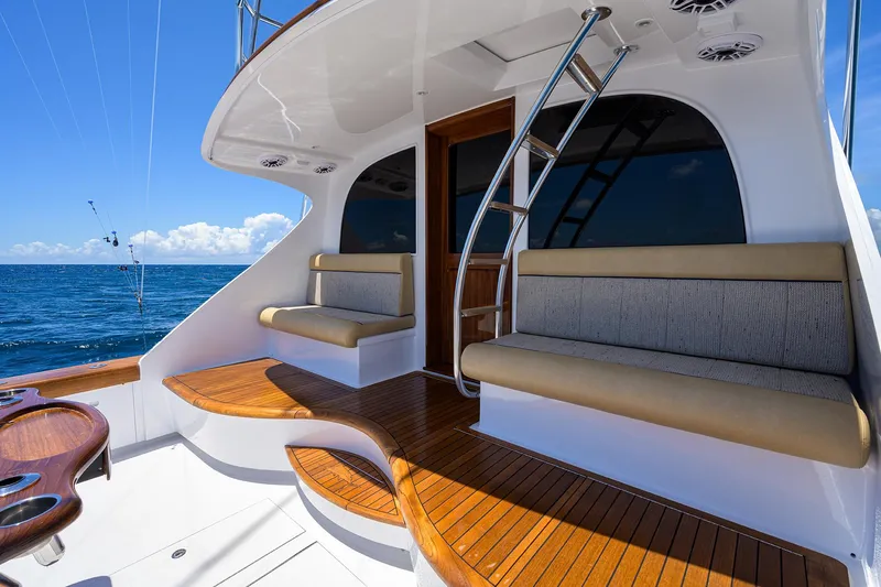  Yacht Photos Pics Luxurious 2022 F&S 58 Custom Carolina yacht with elegant seating and ocean view.