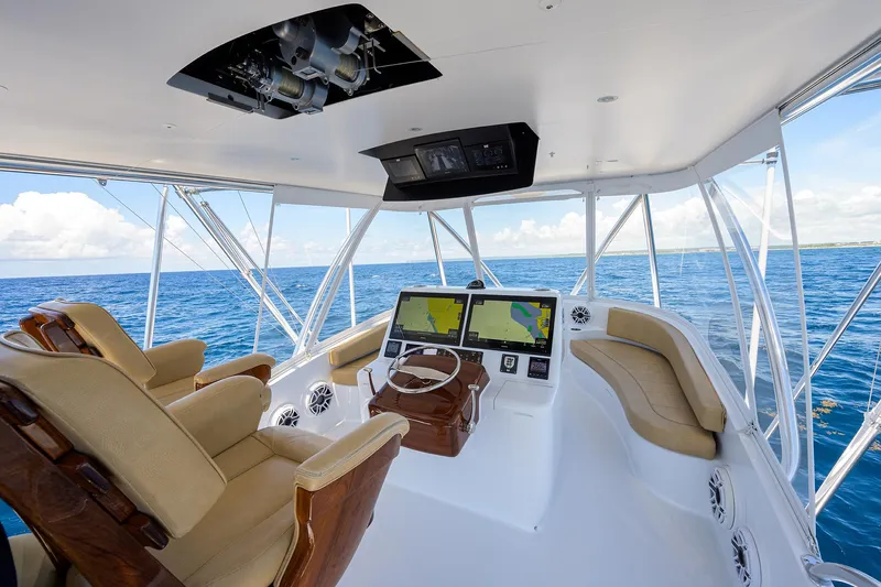  Yacht Photos Pics Helm of 2022 F&S 58 Custom Carolina yacht with navigation screens and ocean view.