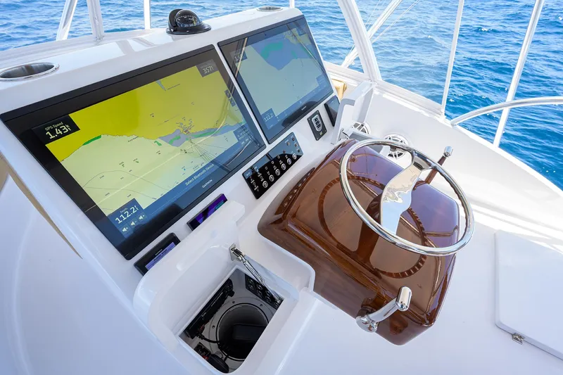  Yacht Photos Pics Helm of 2022 F&S 58 Custom Carolina yacht with dual navigation screens.