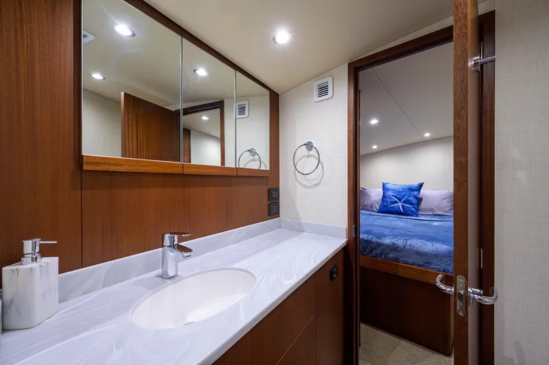  Yacht Photos Pics Luxurious bathroom and bedroom in 2022 F&S 58 Custom Carolina yacht.