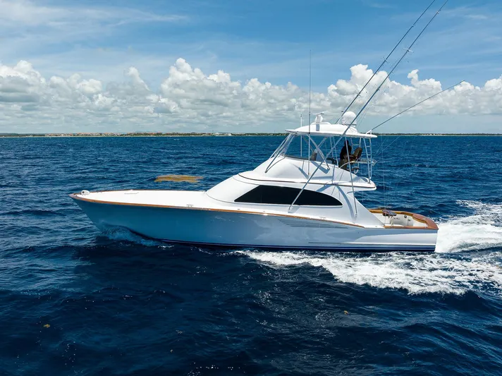  Yacht Photos Pics 2022 F&S 58 Custom Carolina yacht cruising on open ocean under clear skies.