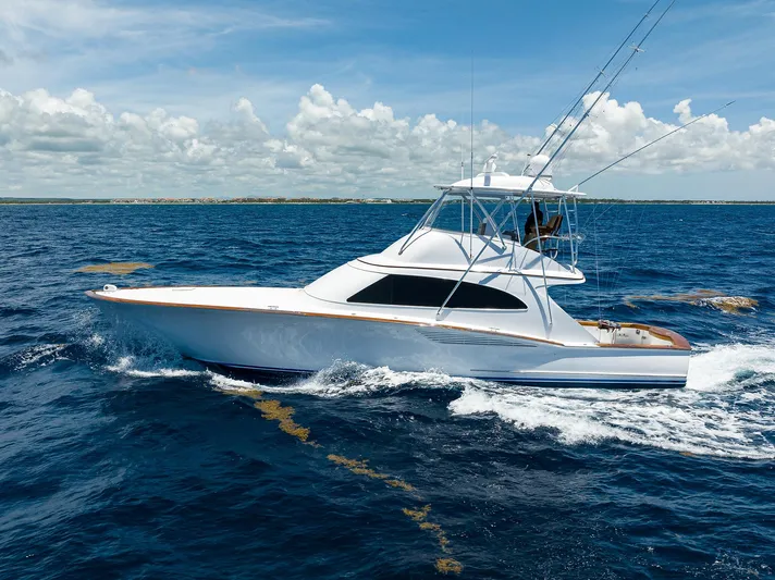  Yacht Photos Pics 2022 F&S 58 Custom Carolina yacht cruising on open ocean under clear skies.