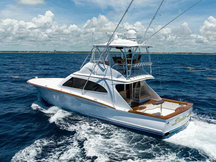  Yacht Photos Pics 2022 F&S 58 Custom Carolina yacht cruising on open ocean under clear skies.