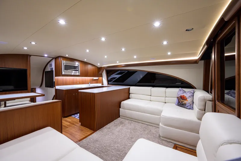  Yacht Photos Pics Luxurious interior of 2022 F&S 58 Custom Carolina yacht with modern furnishings.