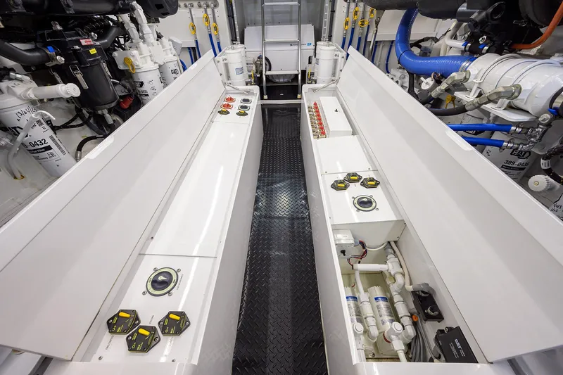  Yacht Photos Pics Engine room of 2022 F&S 58 Custom Carolina yacht, showcasing advanced machinery and controls.