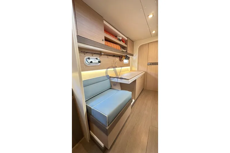  Yacht Photos Pics Interior of 2016 Catana Group Bali 4.0 yacht with seating and storage.