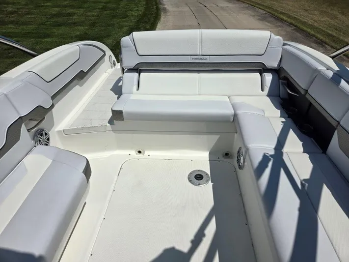  Yacht Photos Pics 2016 Formula 290 Bowrider interior with white seating and spacious layout.