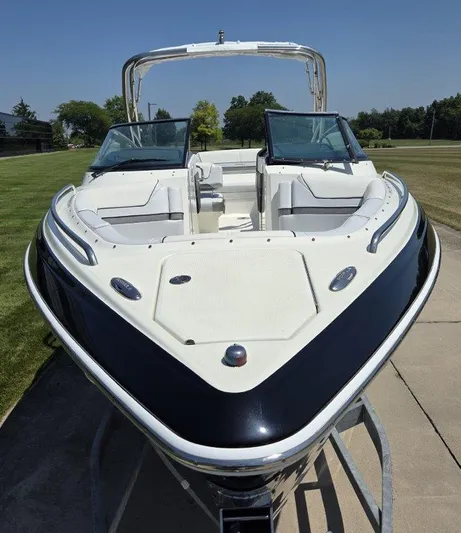  Yacht Photos Pics 2016 Formula 290 Bowrider boat on trailer, featuring sleek design and spacious seating.