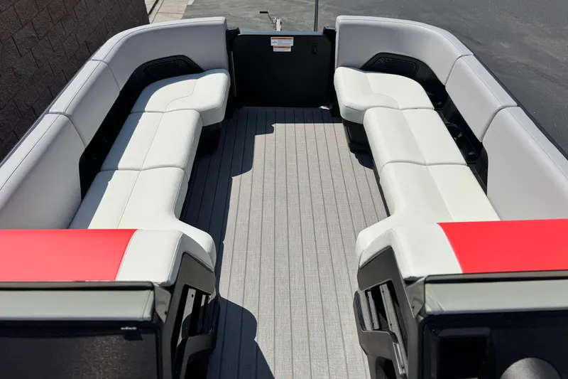 Yacht Photos Pics 2026 Manitou Explore Dual Engine boat interior with spacious seating and modern design.