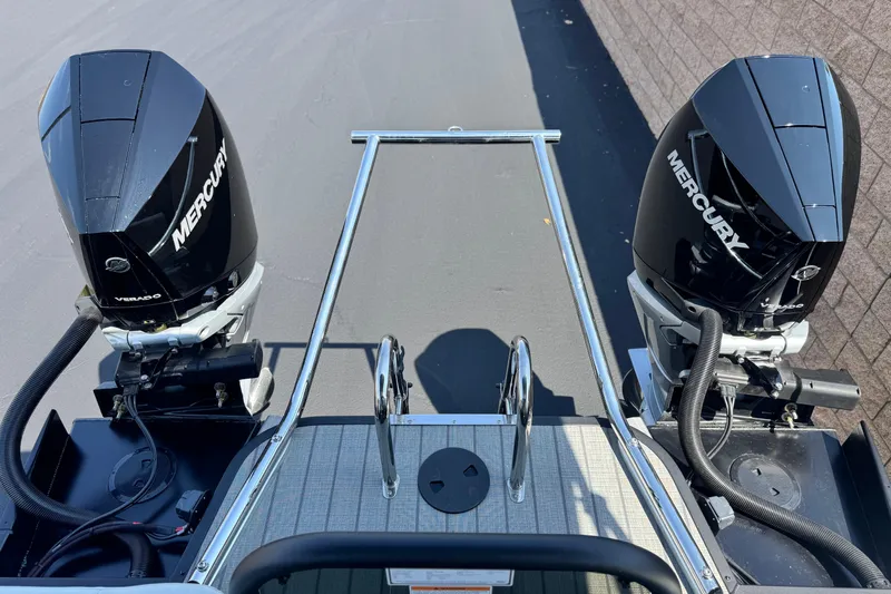  Yacht Photos Pics 2026 Manitou Explore Dual Engine with twin Mercury outboards, rear view.