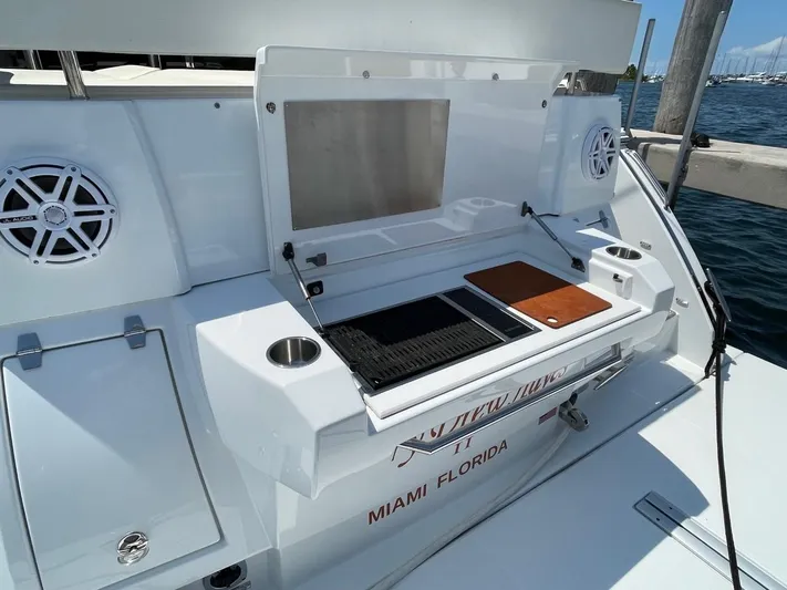  Yacht Photos Pics 2019 Cruisers 50 Cantius yacht with outdoor grill in Miami, Florida.