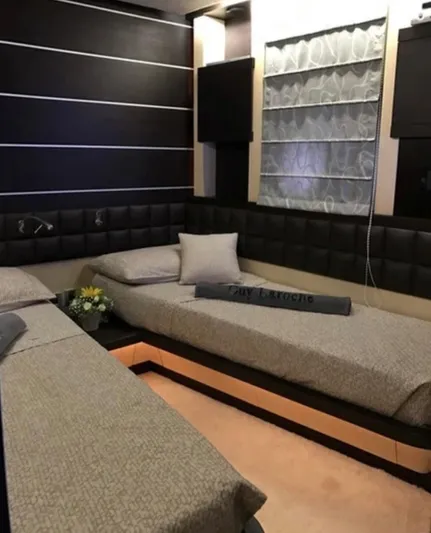  Yacht Photos Pics Luxurious interior of a 2004 Azimut 86S yacht with modern bedding and decor.