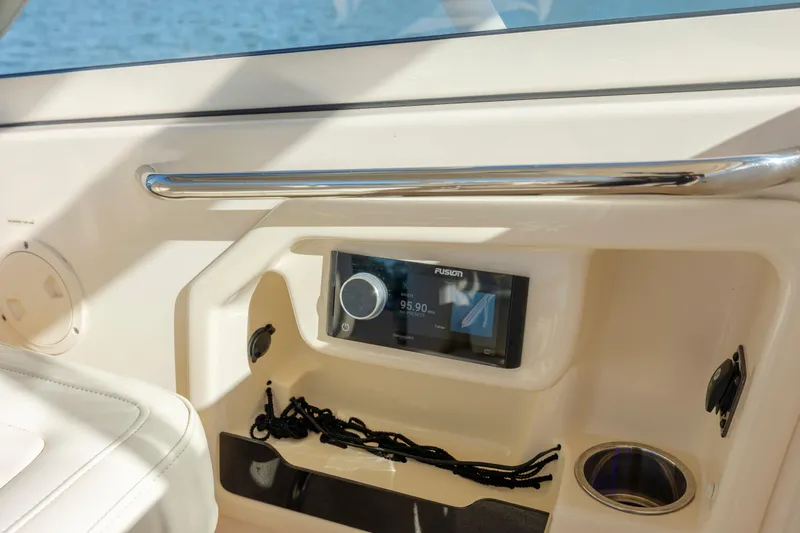  Yacht Photos Pics 2020 Grady-White Freedom 307 boat interior with Fusion stereo system and cup holder.