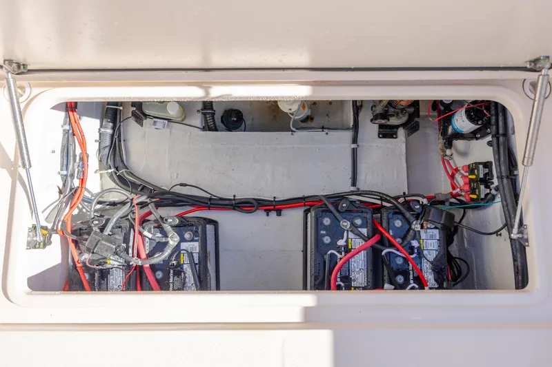  Yacht Photos Pics 2020 Grady-White Freedom 307 boat battery compartment with wiring and components.