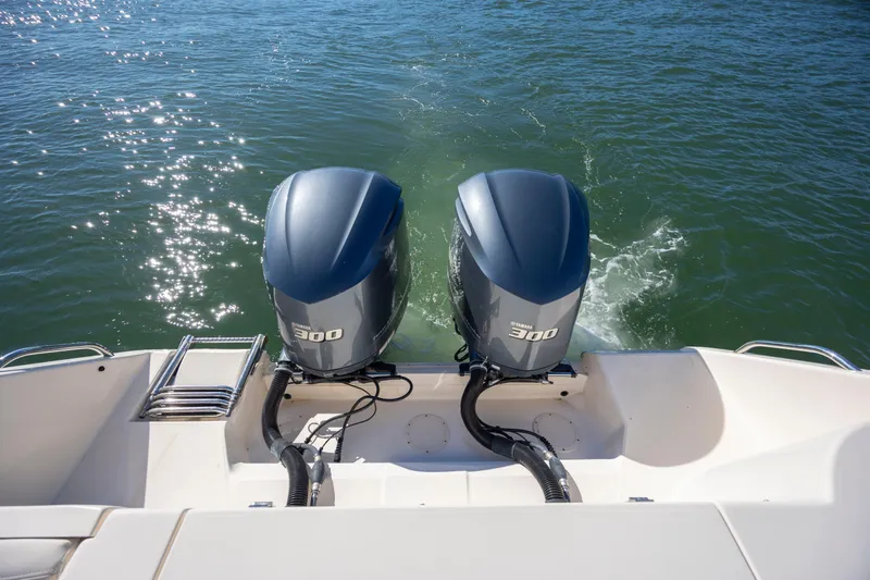  Yacht Photos Pics 2020 Grady-White Freedom 307 boat with twin Yamaha 300 outboard engines on water.
