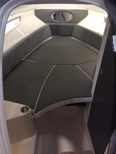  Yacht Photos Pics 2025 Hanover 305 boat interior with sleek seating and modern design.