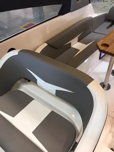  Yacht Photos Pics Luxurious interior of 2025 Hanover 305 boat with modern seating and sleek design.