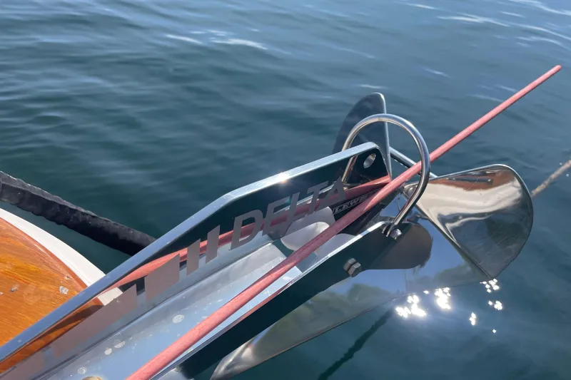 Tenacity Yacht Photos Pics Bow of 2012 Hunt Surfhunter with Delta anchor over calm water.