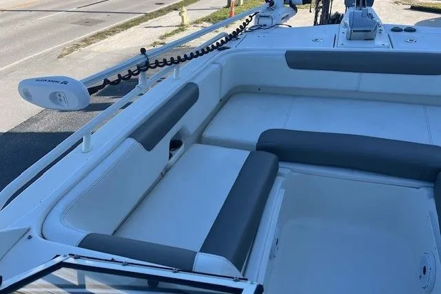  Yacht Photos Pics 2022 World Cat 255 DC boat interior with cushioned seating and modern design.