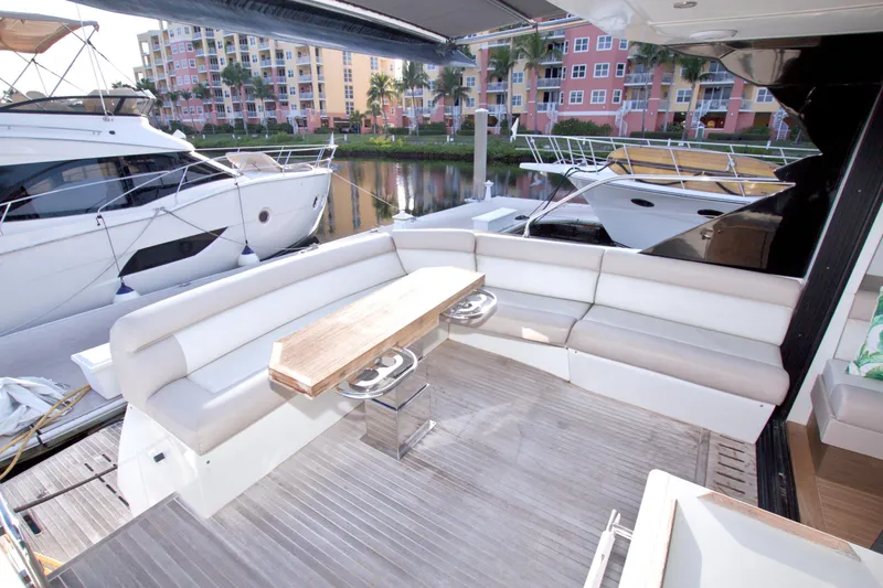 Gail Force Yacht Photos Pics Luxurious 2019 Beneteau Gran Turismo 50 yacht with spacious outdoor seating area.