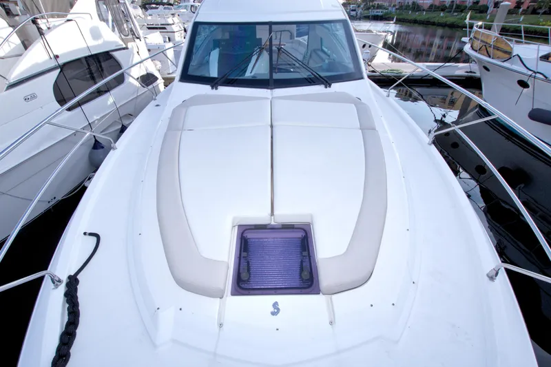 Gail Force Yacht Photos Pics 2019 Beneteau Gran Turismo 50 yacht deck with cushioned seating and hatch.