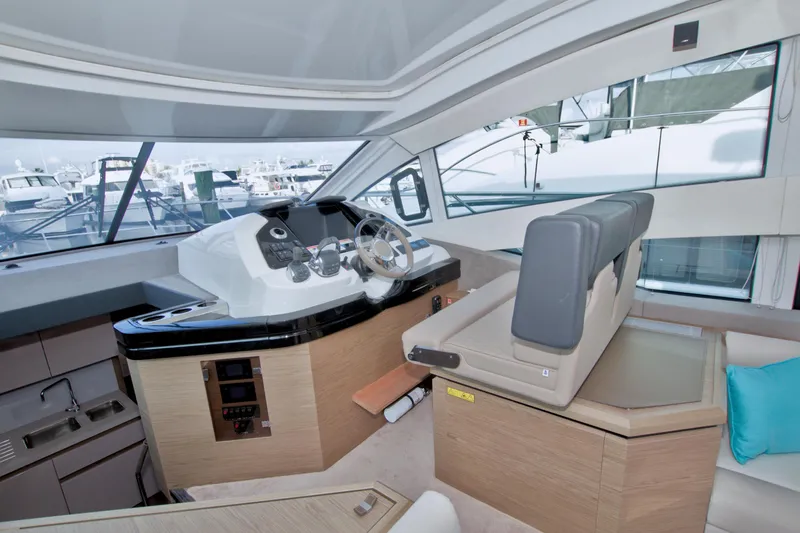 Gail Force Yacht Photos Pics 2019 Beneteau Gran Turismo 50 yacht interior with helm, seating, and modern design.